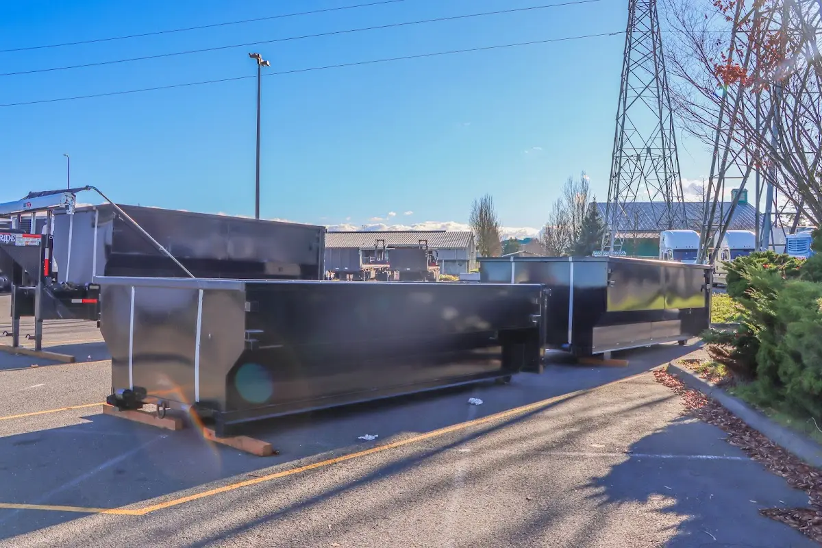 Roll-off dumpster ready for waste disposal at job site for Yard Waste Dumpster Rental in Virginia Beach